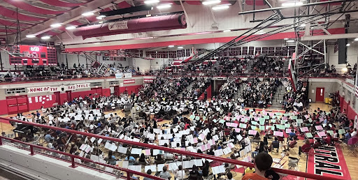 On Friday, Oct. 28, Hinsdale Centrals orchestra collaborated with the feeder middle schools to perform in the main gym at Hinsdale Central.