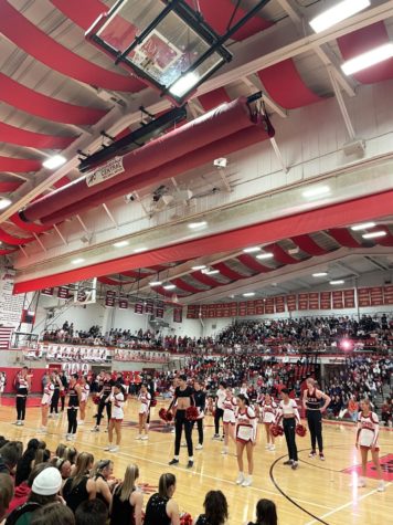 The basketball team cheering with the cheer team on Feb. 3 during the pep rally. 