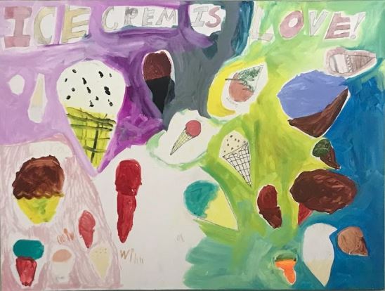 Painting saying “ice cream is love” hung in The Daily Scoop in Clarendon Hills. 