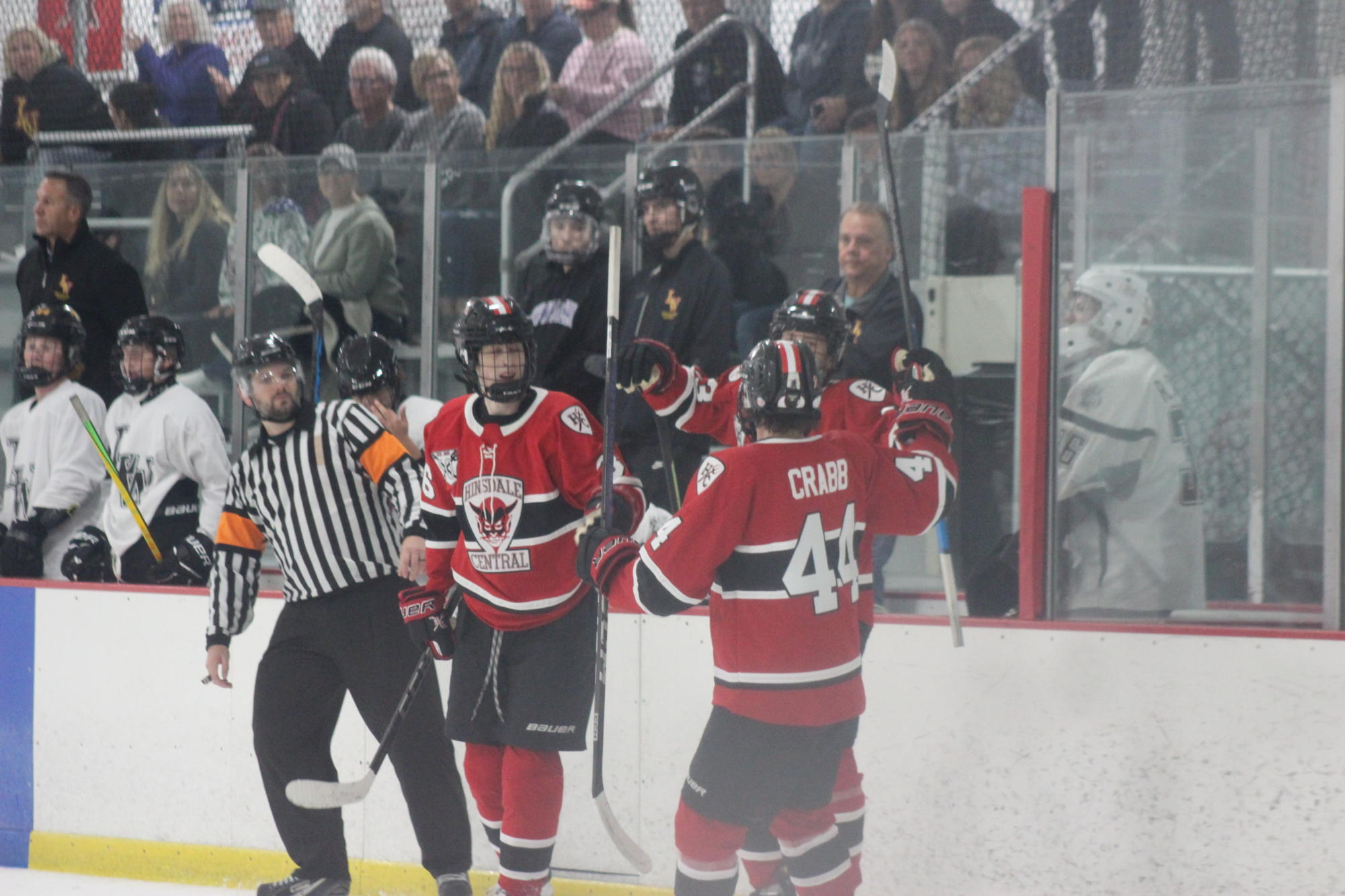 The Devils celebrate their second of five goals against Lincoln-Way.  They would win the game 5-1.