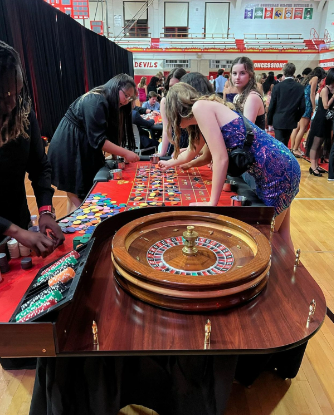 On Saturday, Sept. 23, students played casino-style games in the gym, courtesy of Kiddie Casinos, at the Homecoming dance.