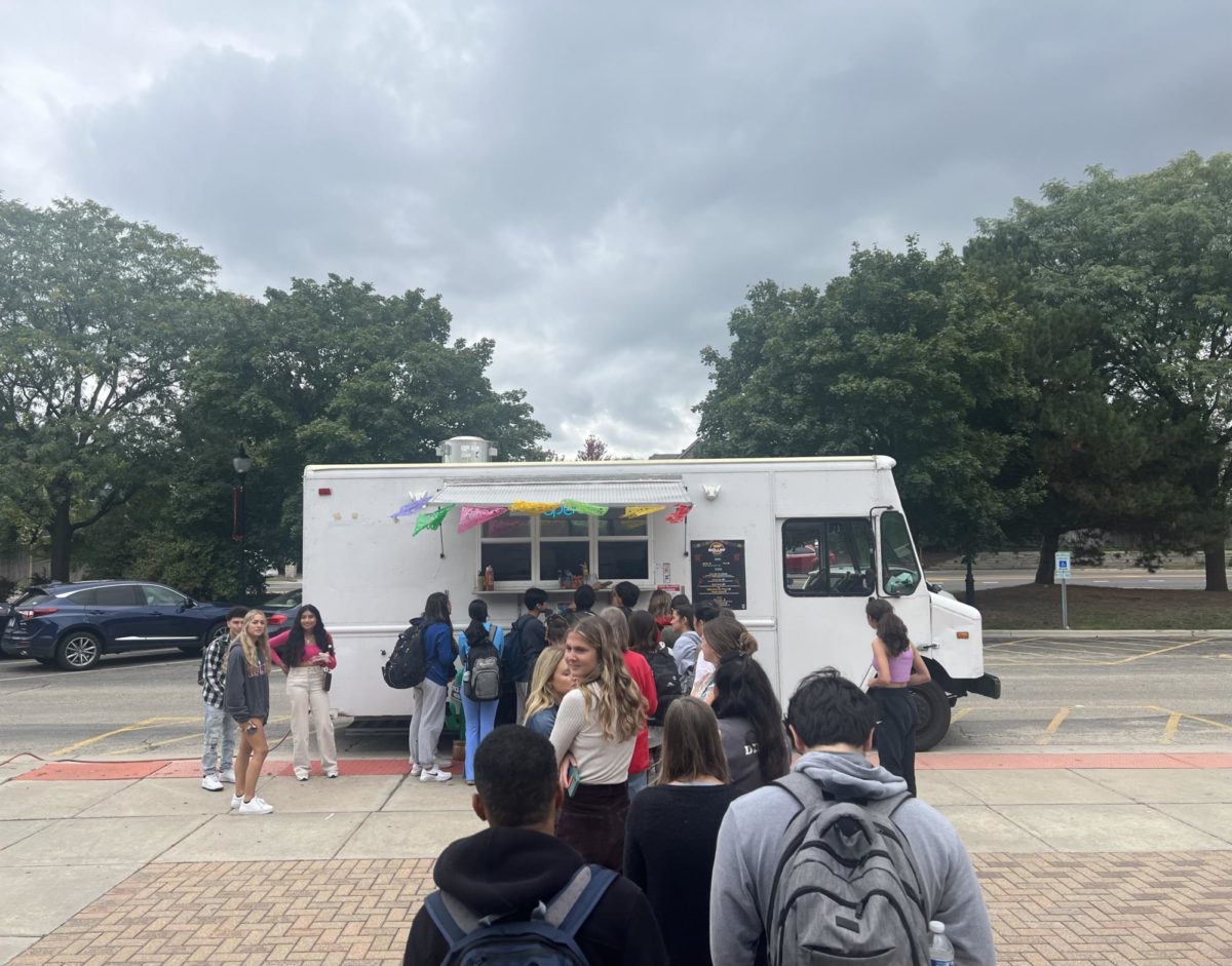 Students wait in line for the taco truck during fifth period lunch.