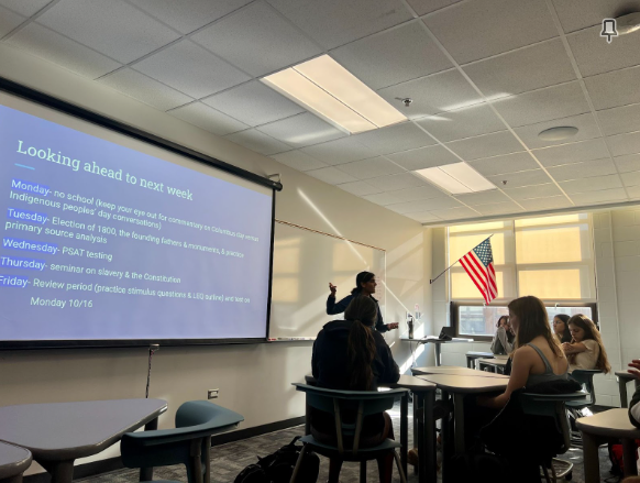 Social Studies teacher Sanskruti Patel presenting on the change to Indigenous Peoples’ Day in an AP US History class.