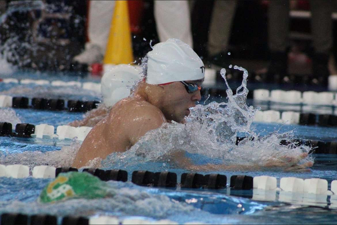 Junior Josh Bey swims at a competition during this swims season. 

courtesy of Josh Bey