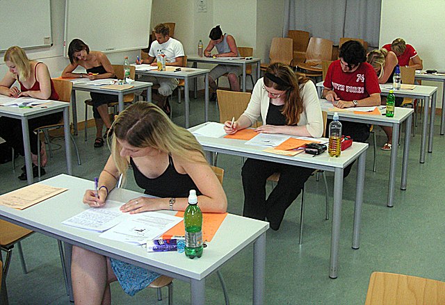 Students taking an exam.