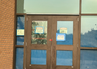 One of the entrances to the pool at Hinsdale Central is boarded up as the pool is temporarily closed for construction.
