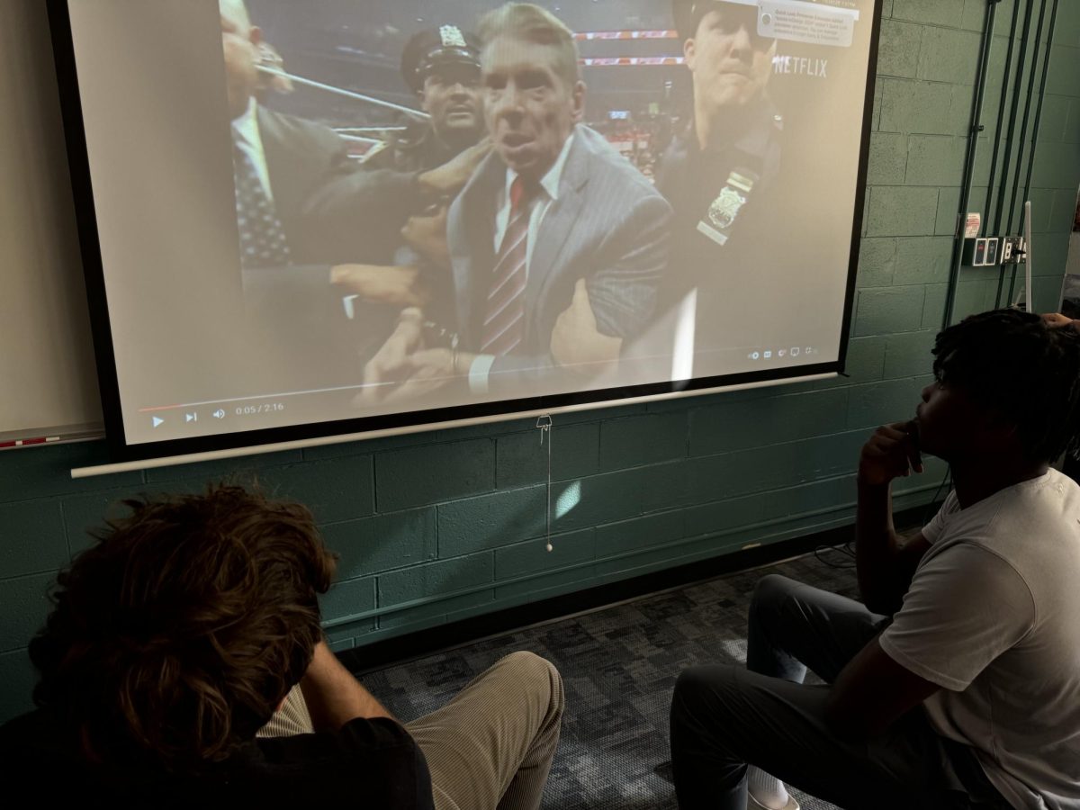 Seniors Tobi Oranu, and Nathan Wietecha watching Mr. McMahon. 