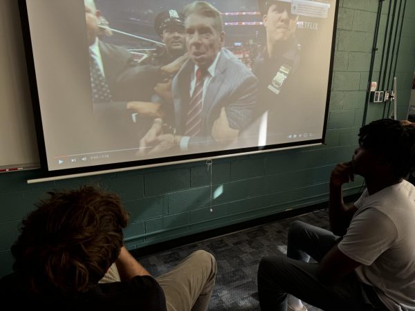 Seniors Tobi Oranu, and Nathan Wietecha watching Mr. McMahon. 