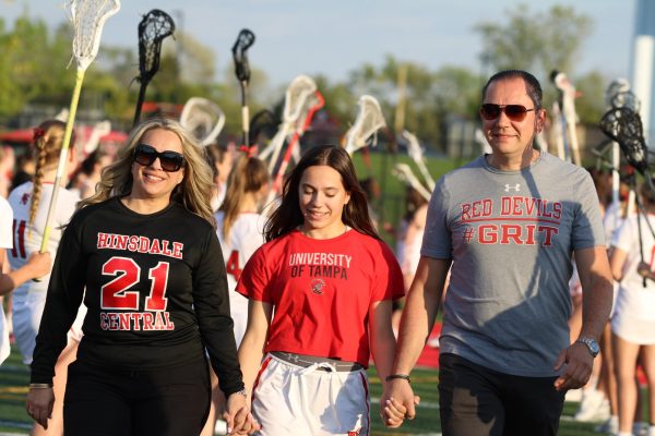 Senior Stefani Andrews walks the field to celebrate senior night on May 6. 