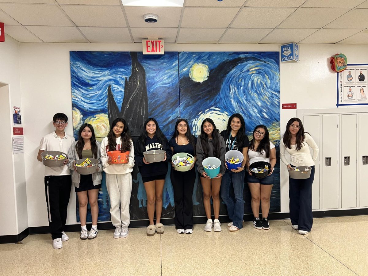 Members of HSA passing out Mexican candy after school on the week of Monday. Sept. 22
