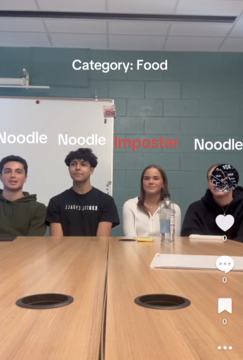 Seniors Niko Miceli, Eeshan Lal, Willa Braden, and Izzy Tornabene play Imposter.