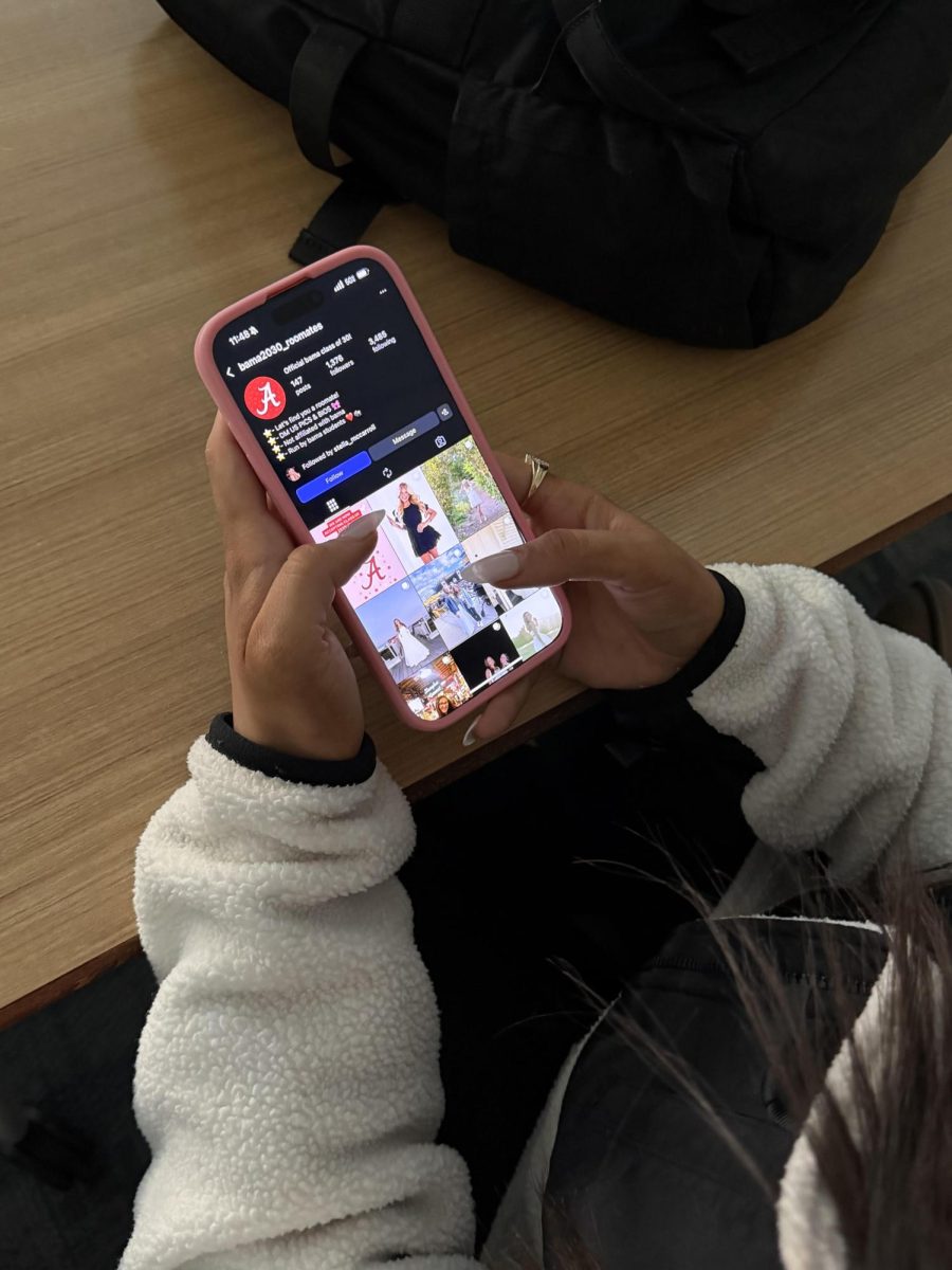 Zena Attassi looks through potential roommates on the “Bam2030” roommate page, one dedicated to admitted students at Ball State University. 
