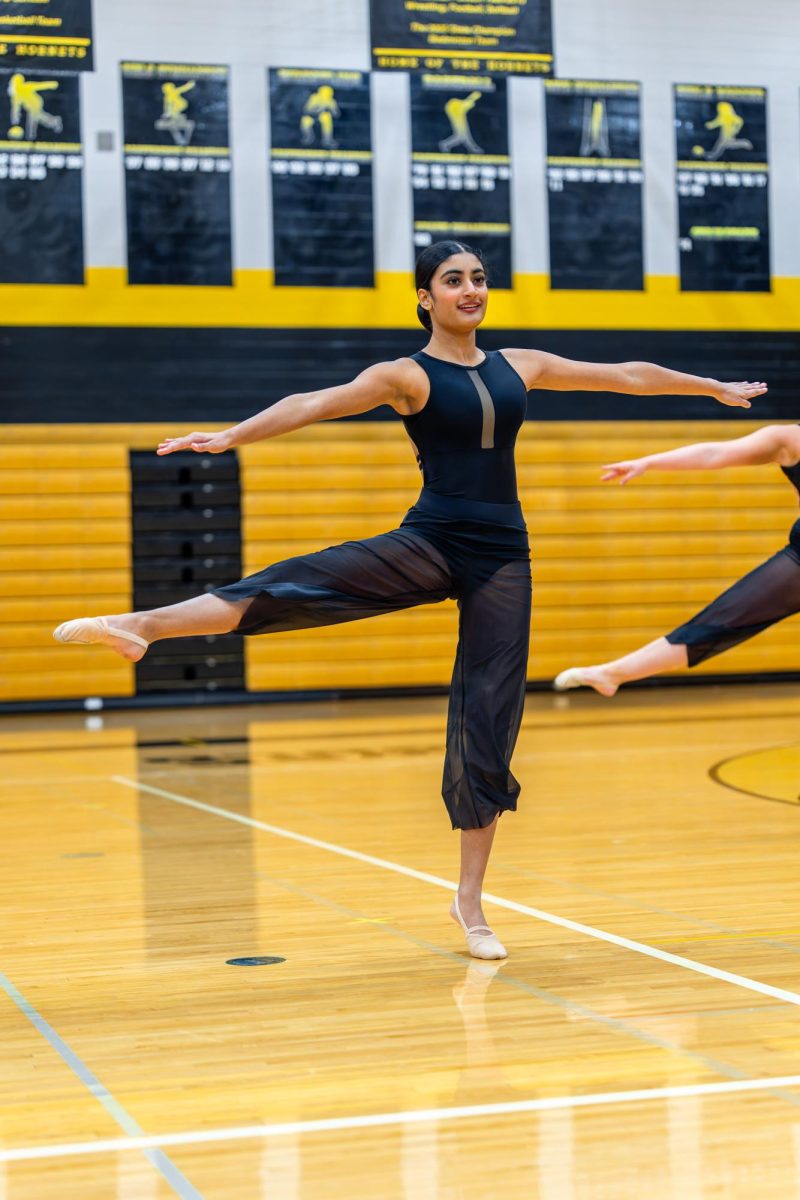 Arya Komanduri performs for the poms competition, a first in the program's existence at the school. 