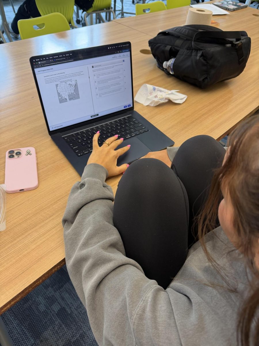 Senior Zena Attassi studying for the AP Government test in late April. 
